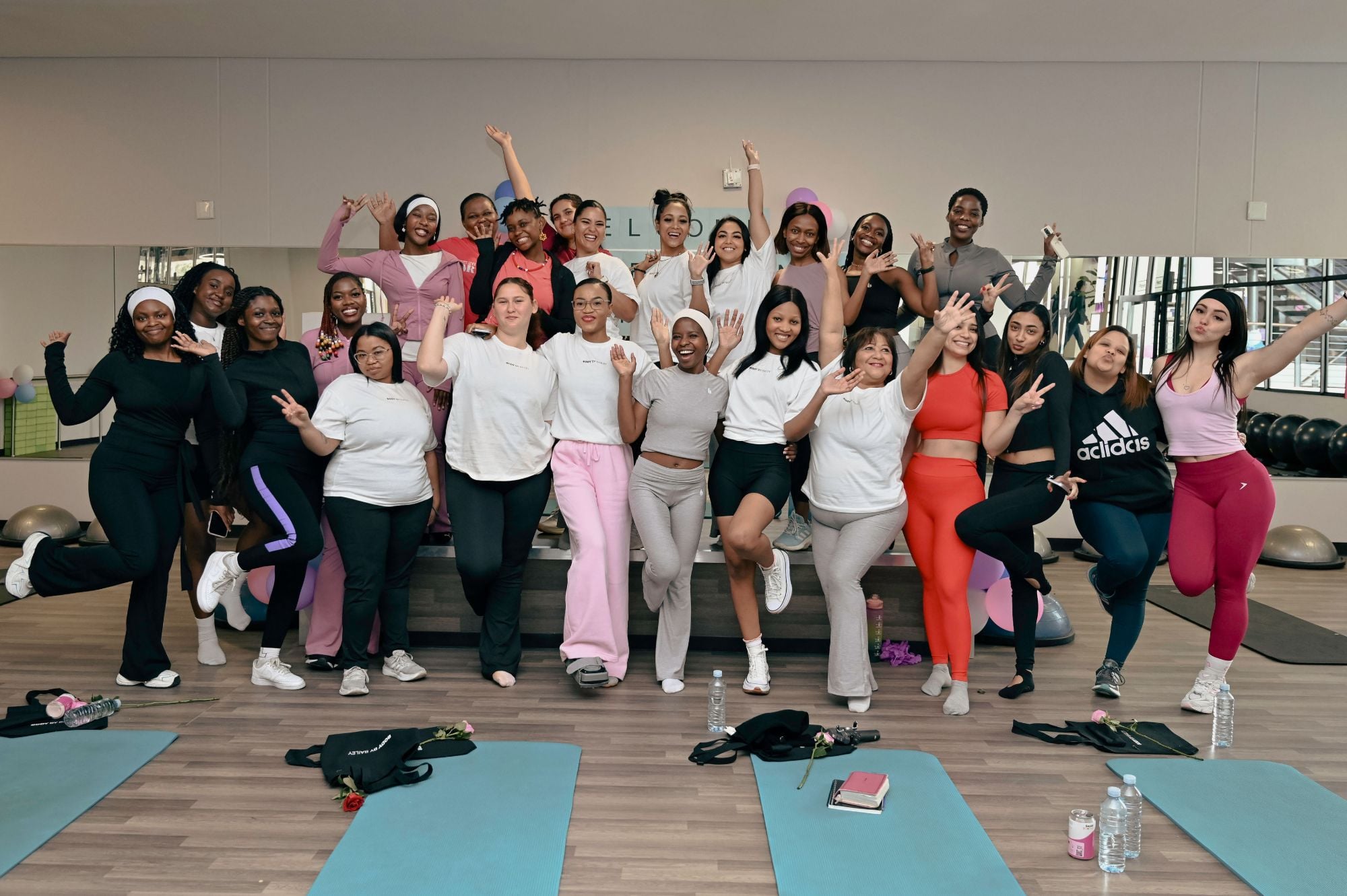 The Joy is Well community celebrating together after Pilates & Praise